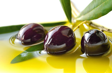 Olives closeup and olive oil