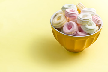 colorful meringues in bowl