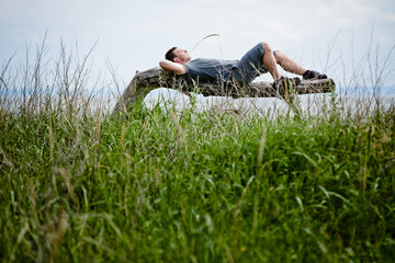 Young Adult Relaxing Peacefully in Nature