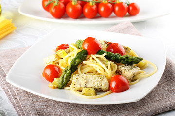 Pasta with swordfish, asparagus and cherry tomatoes