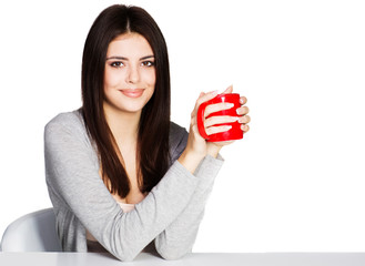 Beautiful young woman with cup 