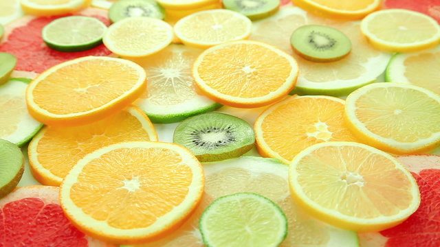 fruits slices: orange, kiwi, grapefruit, lemon, lime, pomelo