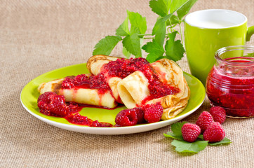 Homemade pancakes with raspberry jam