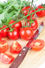 fresh tomatoes, rucola and old knife
