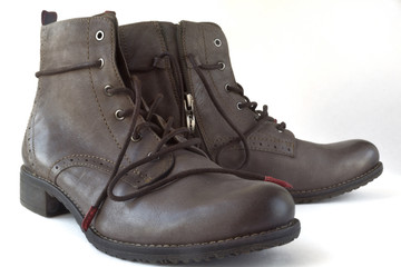 a pair of boots for fall and winter