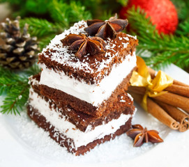 Cream cookies with coconut flakes and Christmas decoration