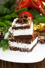 Cream cookies with coconut flakes and Christmas decoration