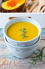Pumpkin cream soup with lentils and rosemary