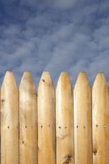 A wooden picket fence