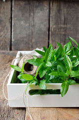 Fresh mint on a wooden background