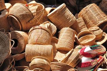 Various rattan containers put for sale in market fair.