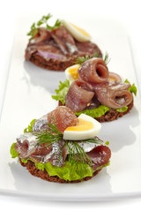 canapes with anchovies and egg