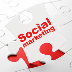 Marketing concept: Social Marketing on puzzle background