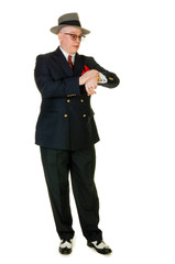 Impatient fifties retro man wearing trilby, on white