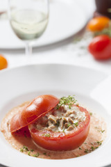 tomatoe stuffed with chanterelles