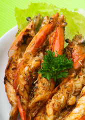 grilled shrimps on background