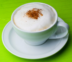 cup of coffee on background