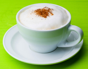cup of coffee on background