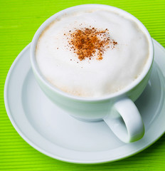 cup of coffee on background