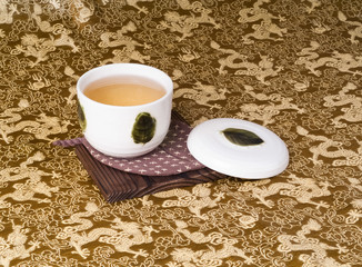 green tea set with a background