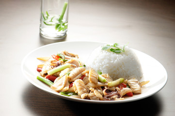 Plain rice cuttlefish with basil leaves