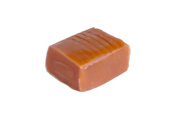 Caramel candy isolated on background