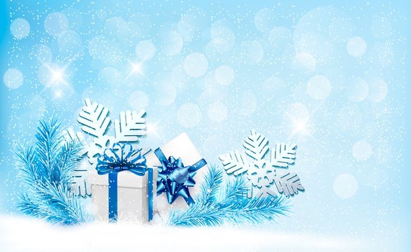 Christmas blue background with gift boxes and snowflakes. Vector