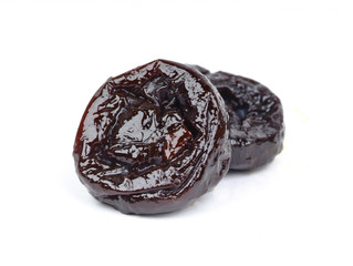 Prunes on a white background
