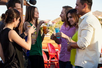 Group of friends having drinks