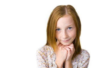 Fototapeta premium Studio portrait of eleven-year-old attractive girl