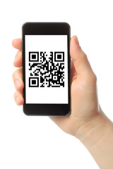 Hand holds smart phone with QR code 