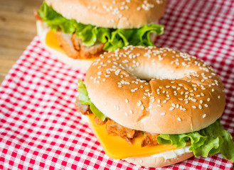 Bagel with fresh cheese and fresh lettuce