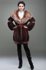 A photo of sexual beautiful girl is in fur clothes