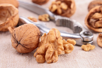 bowl of walnuts and nutcracker