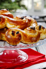 Traditional swedish buns in autumn setting. A saffron bun