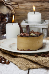 Cappuccino cake on white plate. Selective focus