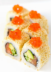 Japan sushi roll with salmon caviar isolated on white