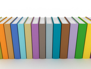 colorful books close up white background
