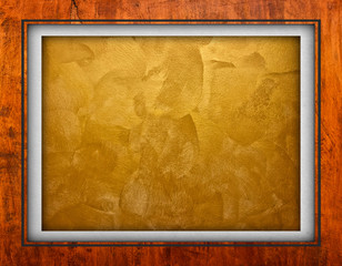 golden painting with wooden frame