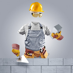 invisible worker with trowel and brick wall