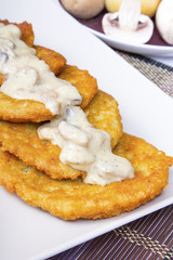 potato pancakes with mushroom sauce