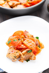 Fried pork with pan-roasted tomatoes