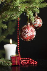 Christmas balls on spruce branch