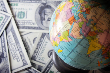 World currency, money and globe