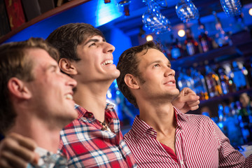 portrait of the fans in the bar