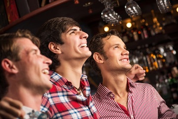 portrait of the fans in the bar