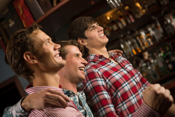 portrait of the fans in the bar