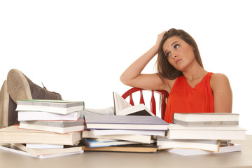Woman red shirt lots of books stress