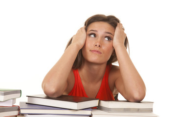 Woman red top books look up