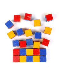 Old colorful wooden blocks on white background
